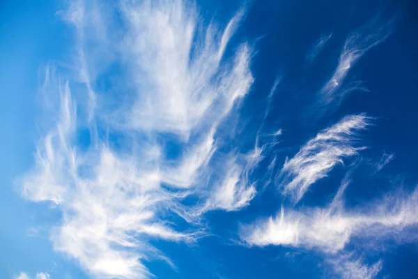 Amazing clouds in blue sky — Stock Photo, Image