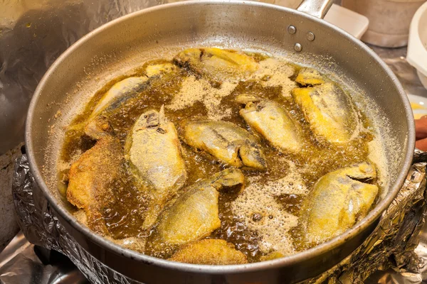 Frying fishes — Stock Photo, Image