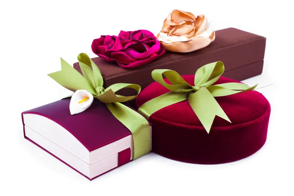 Gift boxes with a green bow on white background — Stock Photo, Image
