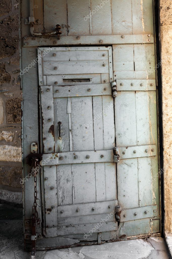 Wooden Door Of Jail Stock Photo C Portokalis 29394269