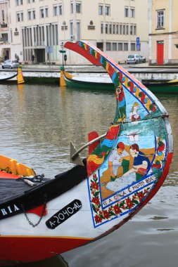 Fishing boats in Aveiro canal, Portugal clipart