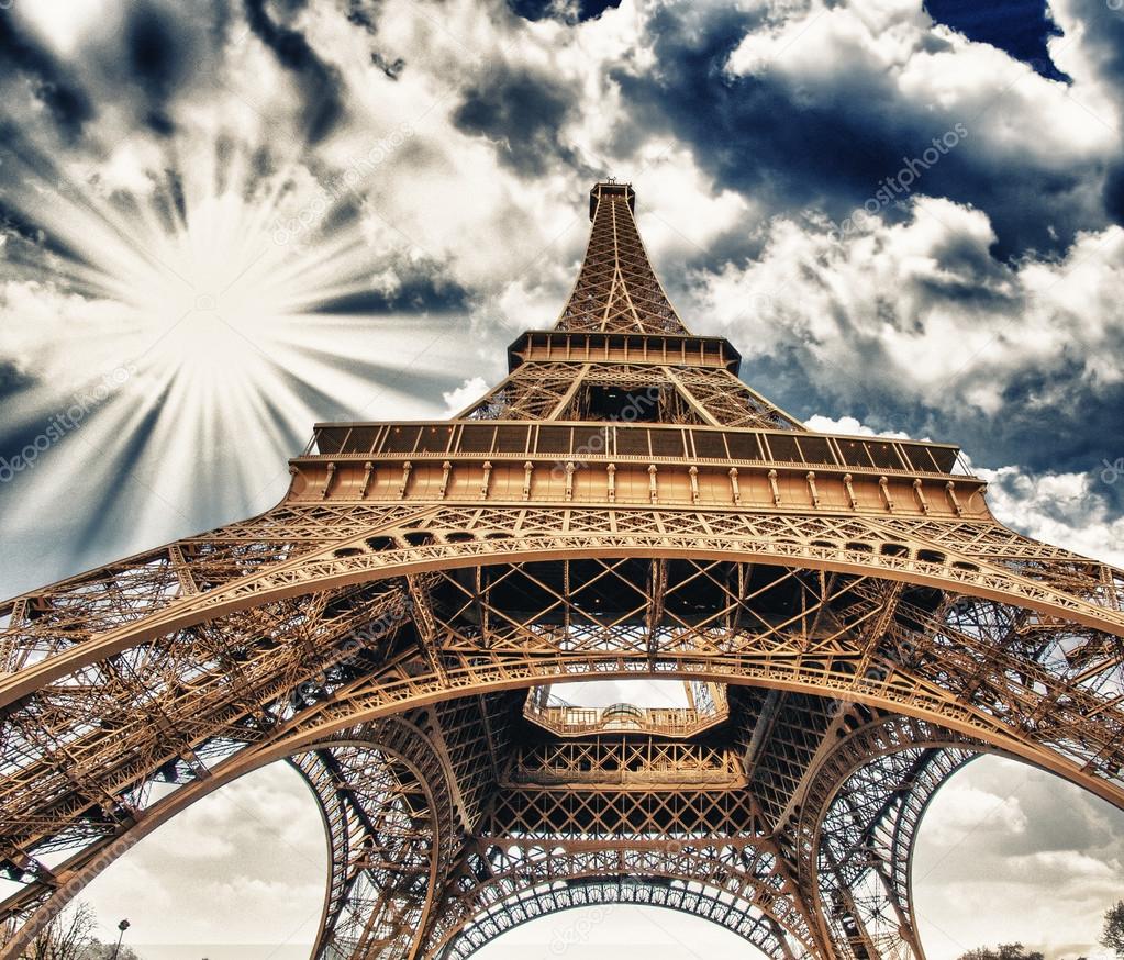 Upward Fisheye view of Eiffel Tower in Paris on a sunny winter m