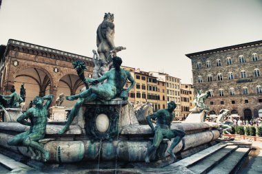 View on Piazza della Signoria and Fountain of Neptune in Florenc clipart