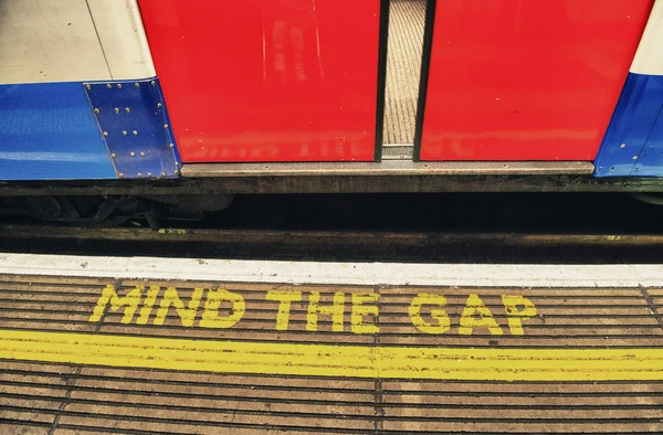 Mind the gap, warning in the London underground — Stock Photo, Image