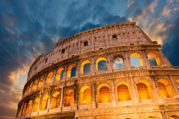 Wonderful view of Colosseum in all its magnificience - Autumn sunset in Rome - Italy