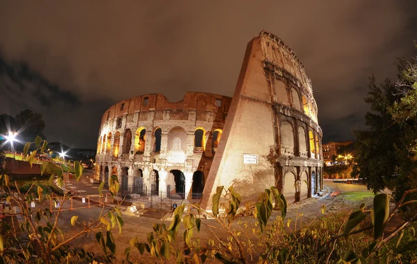 Beautiful wide angle view of Colosseum at Night - Rome Stock Image