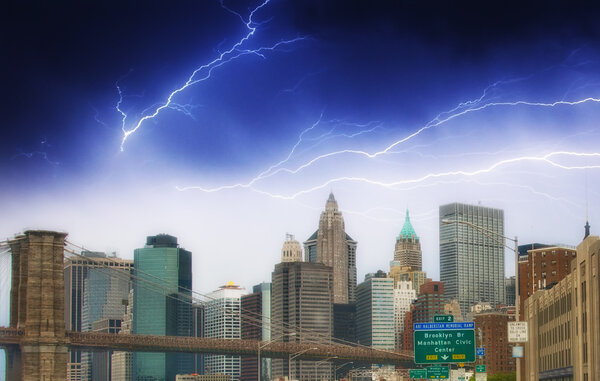 Storm on Lower Manhattan Skyline and tall Skyscrapers - New York City.