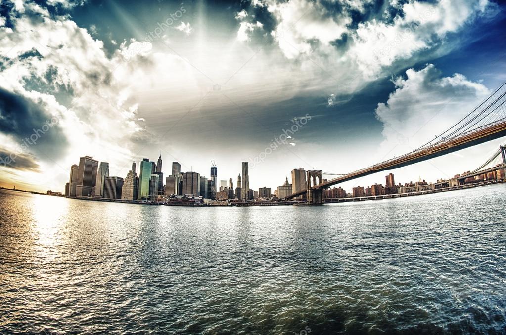 Spectacular view of Brooklyn Bridge from Brooklyn shore at winte