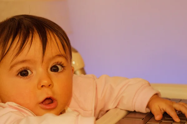 1 Year Baby Girl trying to use her Netbook — Stock Photo, Image