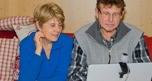 Senior Couple using Notebook for a Video Call — Stock Photo, Image