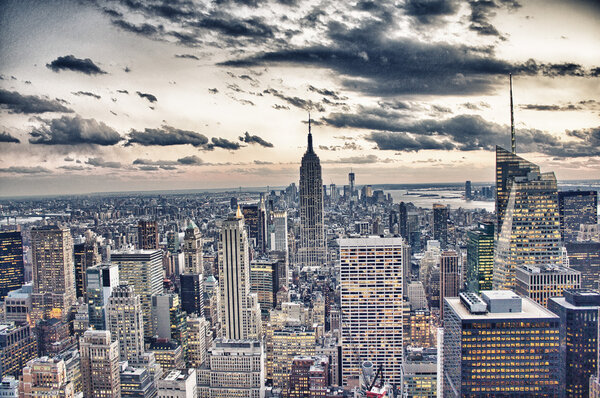 The tight cluster of skyscrapers habituating midtown Manhattan with the famous Empire State Building most prominent
