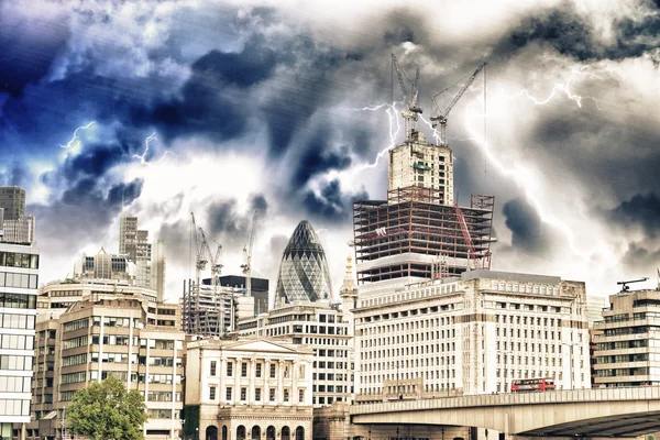Storm above Modern Buildings and Architecture of London in Autum