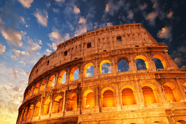 Wonderful view of Colosseum in all its magnificience - Autumn sunset in Rome - Italy