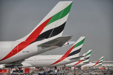 DUBAI - AUG 7: Emirates Airplane in the Dubai airport, UAE clipart