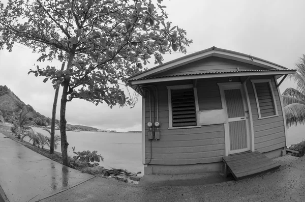 Old small house in front of the Sea, Fisheye view — Stock Photo, Image