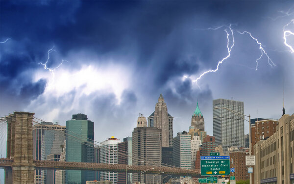 Storm on Lower Manhattan Skyline and tall Skyscrapers - New York City.