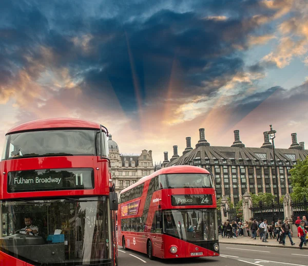 Classic red double decker bus in city streets — Stock Photo, Image