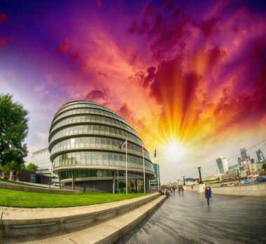 Sunset in London. City Hall area with promenade along River Tham clipart