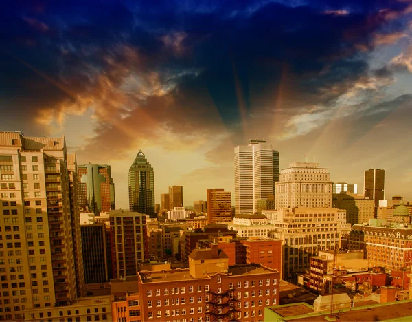 Dramatic sky above Montreal Buildings, Canada - Aerial view