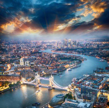 London. Aerial view of Tower Bridge at dusk with beautiful city clipart