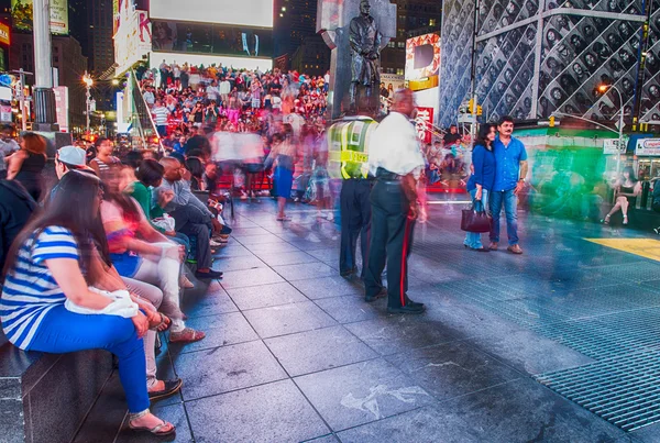 People on the red stairs of Duffy Square — Stock Photo, Image