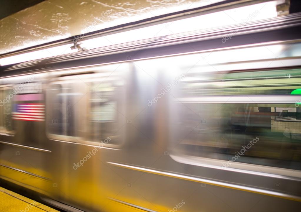 Train in motion inside a subway