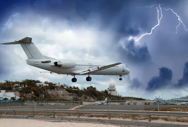 Airplane landing in the storm