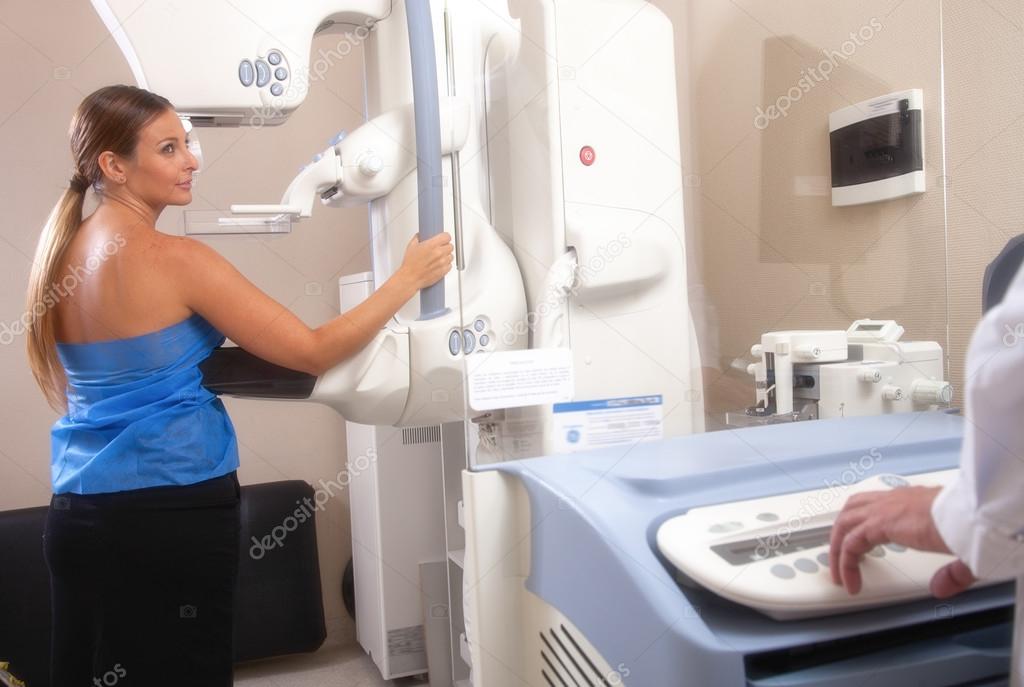 Patient undergoing mammogram