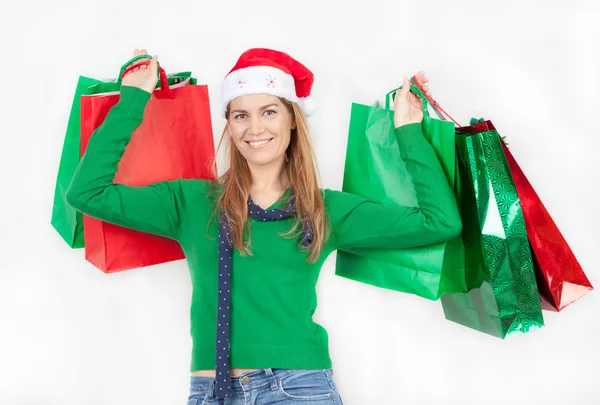 Χριστουγεννιάτικα ψώνια. όμορφα ευτυχισμένη κορίτσι με πολύχρωμα ψώνια — Φωτογραφία Αρχείου