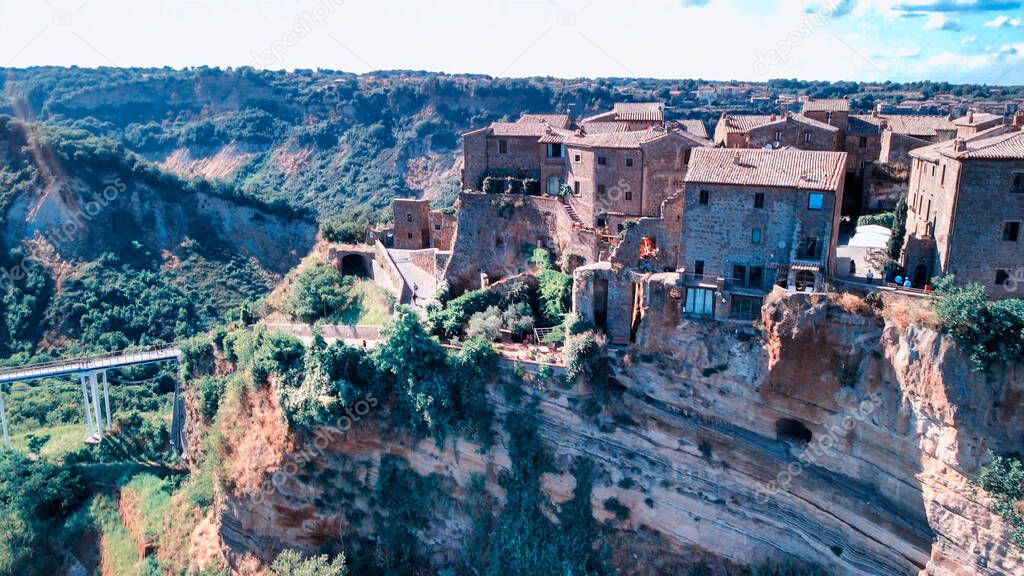 Amazing aerial view of Civita di Bagnoregio landscape in summer season, Italy. This is a famous medieval italian town.