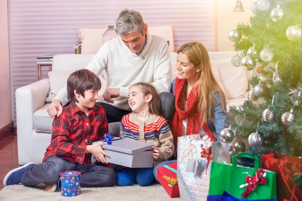 Happy Smiling Caucasian Family Home Christmas Unwrapping Christmas Gifts — Stock Photo, Image