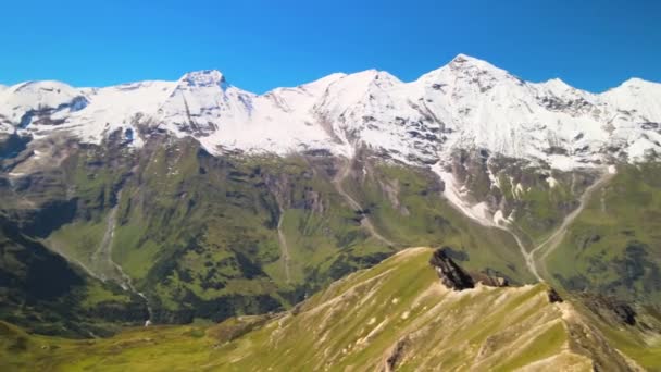 Mountain peaks of Grossglockner in summer season. Aerial view from drone on a sunny day — Stock Video