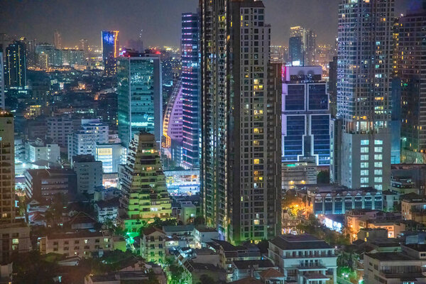 City skyline aerial view at night in Bangkok, Thailand