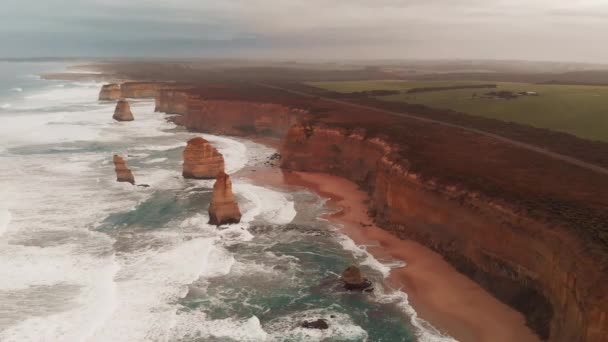 Magnificence of The Twelve Apostles at sunset, Port Campbell National Park, Australia. Aerial view from drone — Stock Video
