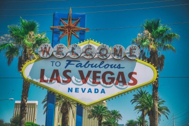 Famous Welcome to Las Vegas sign with alms and blue sky, Nevada, USA