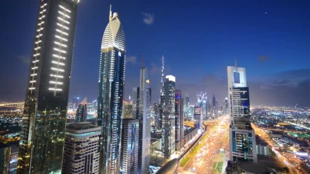 DUBAI, UAE - DECEMBER 12, 2016: Skyscrapers of Downtown Dubai at night, aerial view — Stock Video