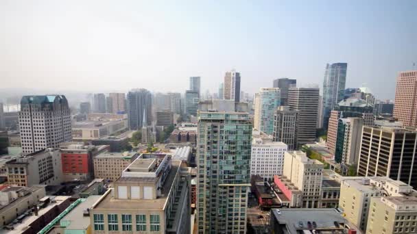 VANCOUVER, CANADA - AUGUST 10, 2017: Aerial view of Downtown Vancouver skyline from an external elevator — Stock Video