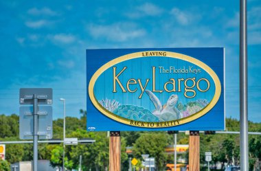 Key Largo, Florida - February 22, 2016: Key Largo welcome street sign along the major road clipart
