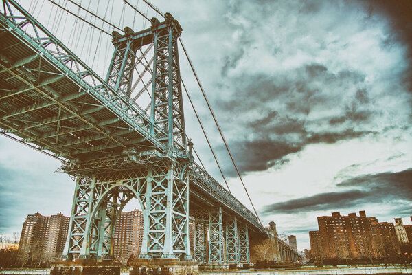 The Manhattan Bridge in New York City as seen from a ferry boat navigating East River