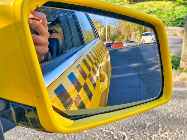 Yellow Black Checkered Taxi Rear Mirror Trip Woman Back Seat — 스톡 사진