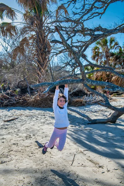 Young Girl Enjoys Outdoor Time Bare Tree Trunks Jekyll Island — 图库照片