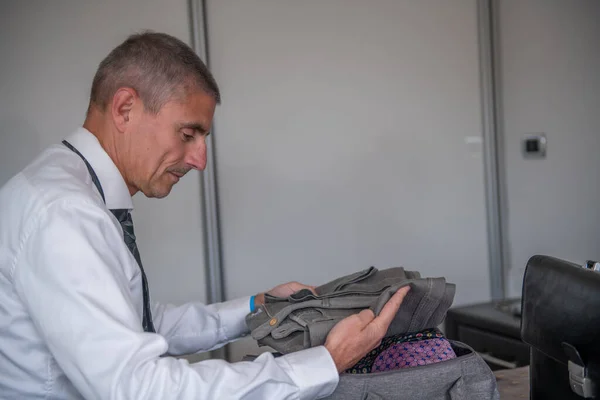 Businessman Packs His Suitcase Business Trip Briefcase Clothes Bed — Stockfoto