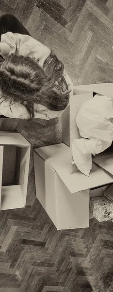 Moving New Home Concept Young Girl Seated Cardboard Boxes Parquet — Stock fotografie