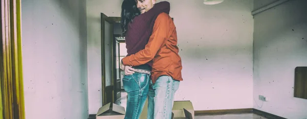 Husband Jeans Lifting His Wife Surrounded Cardboard Boxes Excited Move — ストック写真