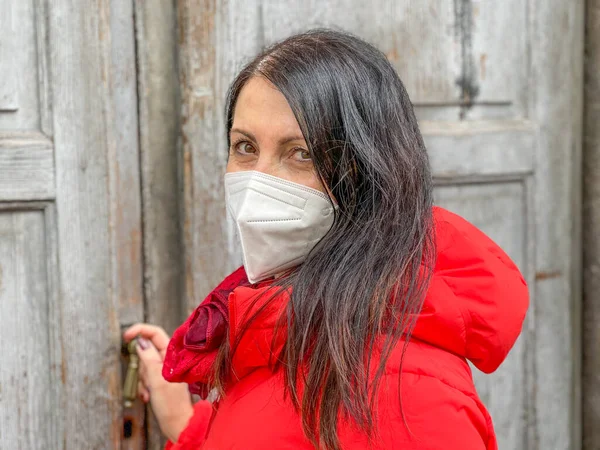 Beautiful Woman Wearing Mouth Mask Entering Home — Stock Fotó