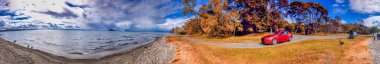 Panoramic view of Lake Taupo in New Zealand, autumn season.