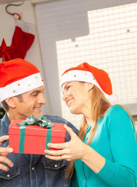 Happy Young Couple Relaxing Home Christmas Unboxing Gifts — Stock Photo, Image