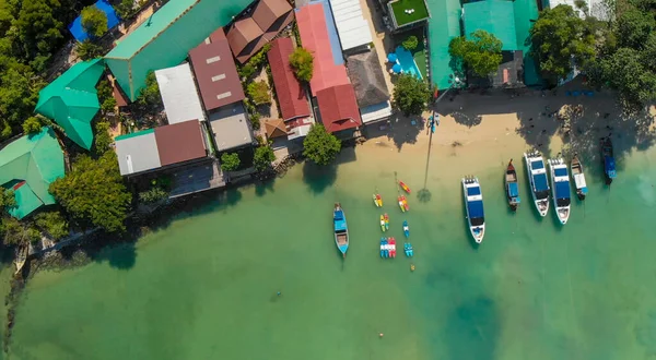 Phi Phi Don, Thailand. Overhead aerial view of Phi Phi Island coastline and beach from drone on a hot sunny day