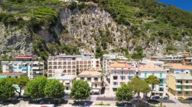 aerial footage of small town in beautiful town in mountains