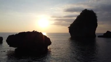 aerial footage of beautiful seashore on sunset